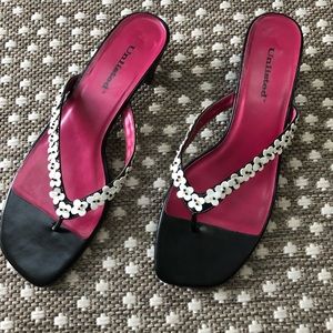 Gently used Unlisted thong heeled sandals size 10